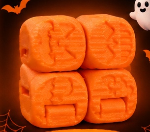 Orange Halloween fidget cube with spooky embossed designs